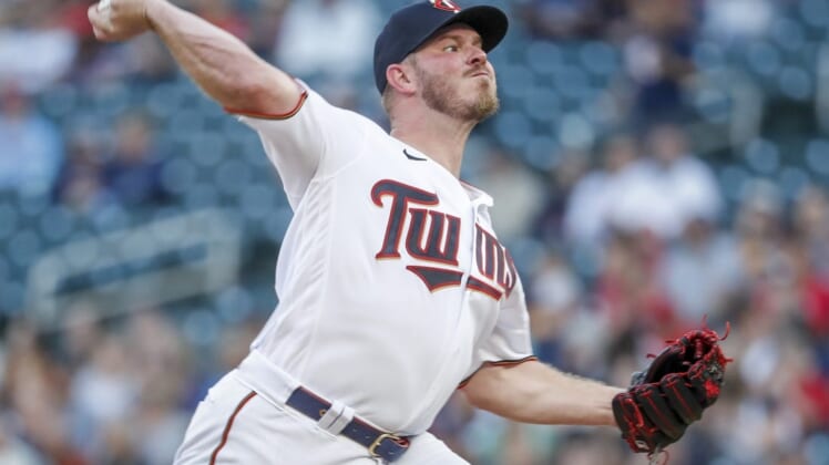 Aug 19, 2022; Minneapolis, Minnesota, USA; Minnesota Twins starting pitcher Dylan Bundy (37) throws to the Texas Rangers in the first inning at Target Field. Mandatory Credit: Bruce Kluckhohn-USA TODAY Sports
