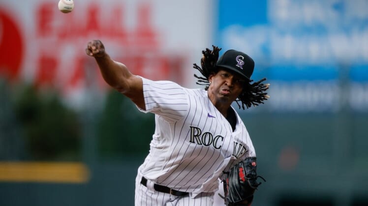 Aug 19, 2022; Denver, Colorado, USA; Colorado Rockies starting pitcher Jose Urena (51) pitches in the first inning against the San Francisco Giants at Coors Field. Mandatory Credit: Isaiah J. Downing-USA TODAY Sports