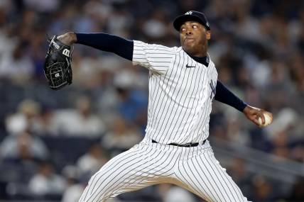 Aug 19, 2022; Bronx, New York, USA; New York Yankees relief pitcher Aroldis Chapman (54) pitches against the Toronto Blue Jays during the ninth inning at Yankee Stadium. Mandatory Credit: Brad Penner-USA TODAY Sports