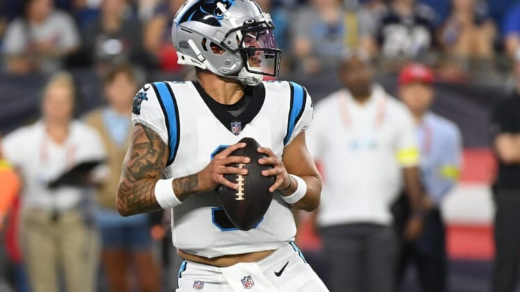 Aug 19, 2022; Foxborough, Massachusetts, USA;Carolina Panthers quarterback Matt Corral (9) drops back to pass during the first half of a preseason game against the New England Patriots at Gillette Stadium. Mandatory Credit: Eric Canha-USA TODAY Sports