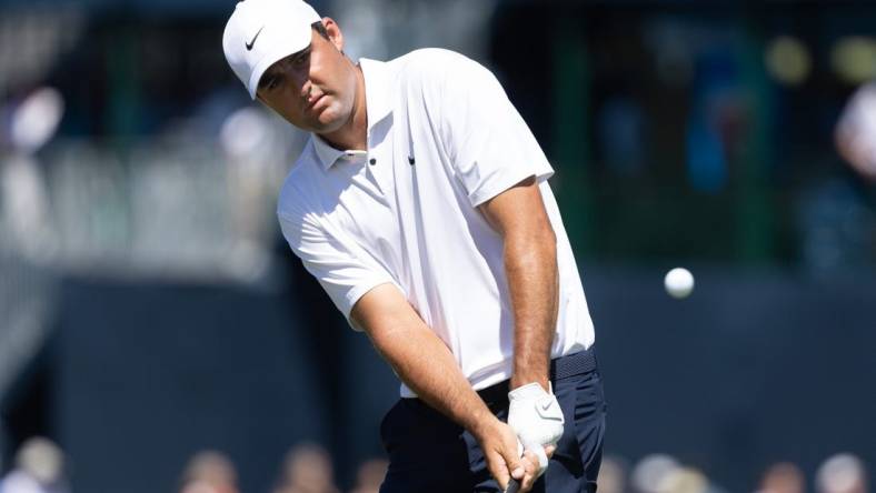 Aug 20, 2022; Wilmington, Delaware, USA; Scottie Scheffler chips onto the second green during the third round of the BMW Championship golf tournament. Mandatory Credit: Bill Streicher-USA TODAY Sports