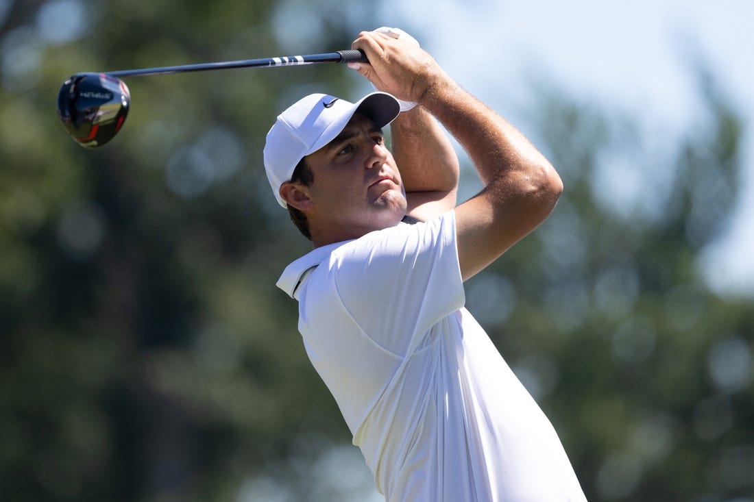 Aug 20, 2022; Wilmington, Delaware, USA; Scottie Scheffler plays his shot from the third tee during the third round of the BMW Championship golf tournament. Mandatory Credit: Bill Streicher-USA TODAY Sports