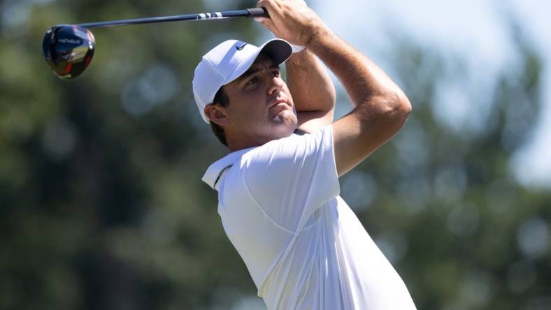 Aug 20, 2022; Wilmington, Delaware, USA; Scottie Scheffler plays his shot from the third tee during the third round of the BMW Championship golf tournament. Mandatory Credit: Bill Streicher-USA TODAY Sports