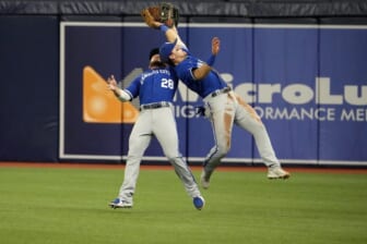 Aug 20, 2022; St. Petersburg, Florida, USA;  Kansas City Royals left fielder Kyle Isbel (28) (left) and second baseman Michael Massey (19) (right) both reach for a fly ball hit by Tampa Bay Rays center fielder Jose Siri (22) in the fourth inning at Tropicana Field. Massey caught the ball. Mandatory Credit: Dave Nelson-USA TODAY Sports