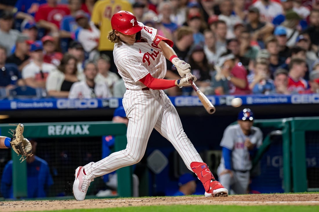 Aug 20, 2022; Philadelphia, Pennsylvania, USA; Philadelphia Phillies third baseman Alec Bohm (28) hits a two RBI double against the New York Mets during the third inning at Citizens Bank Park. Mandatory Credit: John Jones-USA TODAY Sports