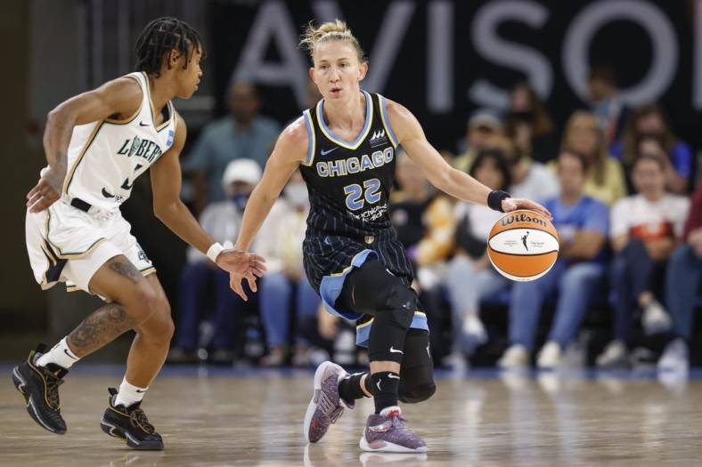 Aug 20, 2022; Chicago, Illinois, USA; Chicago Sky guard Courtney Vandersloot (22) is defended by New York Liberty guard Crystal Dangerfield (3) during the first half of Game 2 of the first round of the WNBA playoffs at Wintrust Arena. Mandatory Credit: Kamil Krzaczynski-USA TODAY Sports