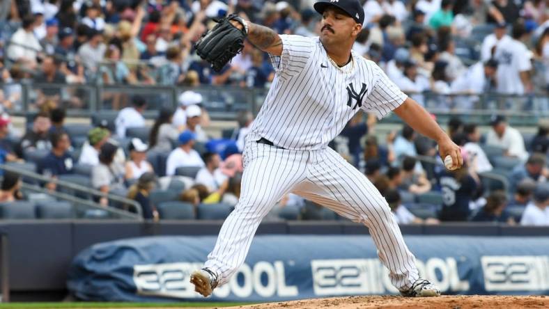 Aug 21, 2022; Bronx, New York, USA; New York Yankees starting pitcher Nestor Cortes (65) throws a pitch during the second inning against the Toronto Blue Jays during the game at Yankee Stadium. Mandatory Credit: Dennis Schneidler-USA TODAY Sports