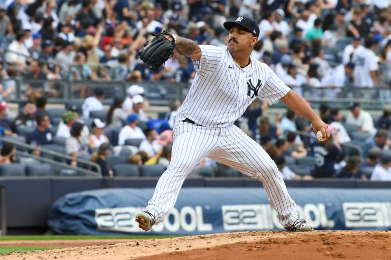 Aug 21, 2022; Bronx, New York, USA; New York Yankees starting pitcher Nestor Cortes (65) throws a pitch during the second inning against the Toronto Blue Jays during the game at Yankee Stadium. Mandatory Credit: Dennis Schneidler-USA TODAY Sports