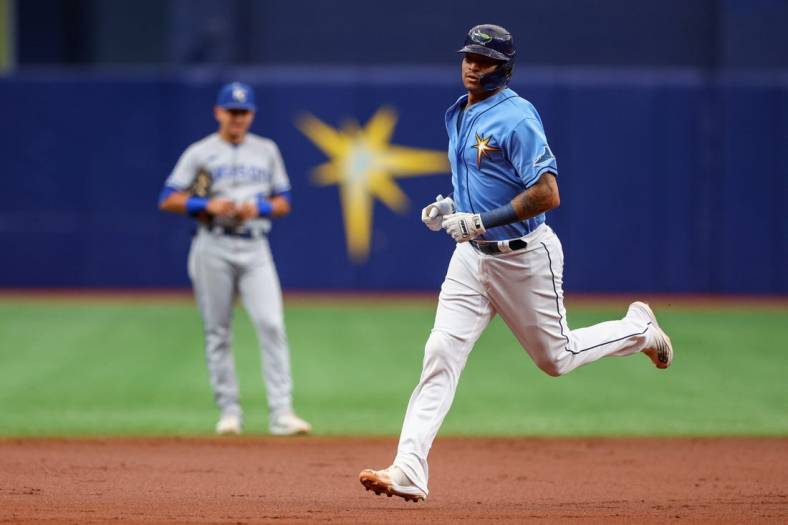 Aug 21, 2022; St. Petersburg, Florida, USA;  Tampa Bay Rays catcher Christian Bethancourt (14) runs the bases after hitting a home run against the Kansas City Royals in the second inning at Tropicana Field. Mandatory Credit: Nathan Ray Seebeck-USA TODAY Sports