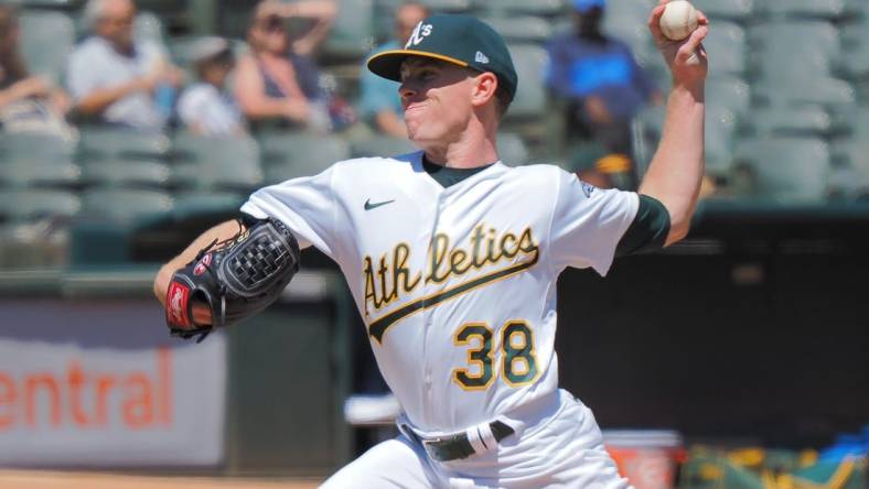 Aug 21, 2022; Oakland, California, USA; Oakland Athletics starting pitcher JP Sears (38) pitches the ball against the Seattle Mariners during the first inning at RingCentral Coliseum. Mandatory Credit: Kelley L Cox-USA TODAY Sports