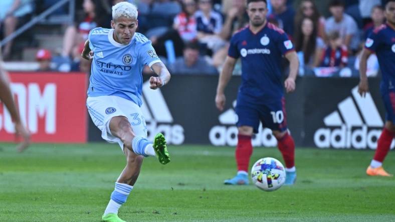 Aug 21, 2022; Chicago, Illinois, USA;  New York City FC midfielder Gabriel Pereira dos Santos (38) shoots for a goal in the first half against the Chicago Fire FC at Bridgeview Stadium. Mandatory Credit: Jamie Sabau-USA TODAY Sports