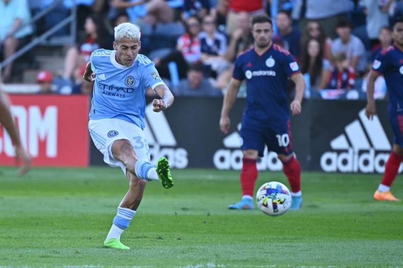 Aug 21, 2022; Chicago, Illinois, USA;  New York City FC midfielder Gabriel Pereira dos Santos (38) shoots for a goal in the first half against the Chicago Fire FC at Bridgeview Stadium. Mandatory Credit: Jamie Sabau-USA TODAY Sports