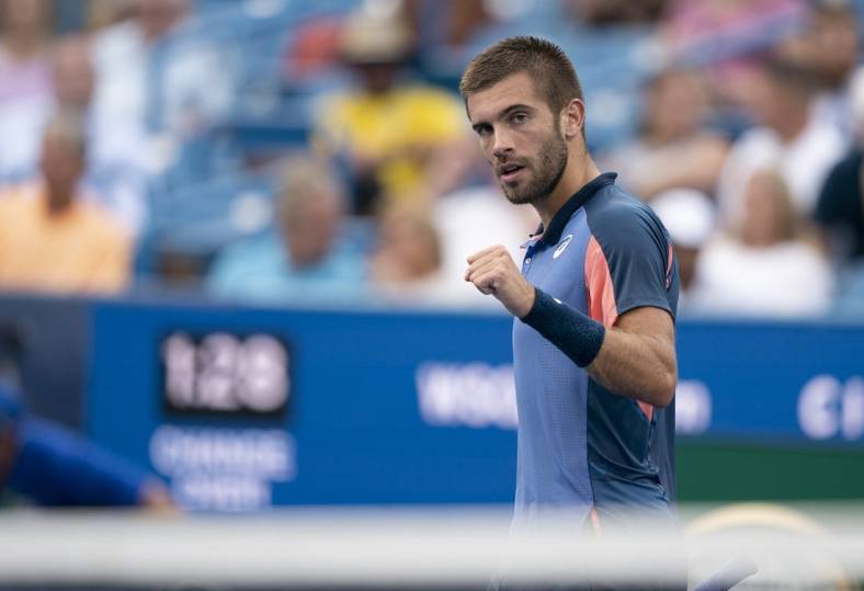 Aug 21, 2022; Cincinnati, OH, USA; Borna Coric (CRO) reacts to a shot during the men   s final match against Stefanos Tsitsipas (GRE) at the Western & Southern Open at the Lindner Family Tennis Center. Mandatory Credit: Susan Mullane-USA TODAY Sports