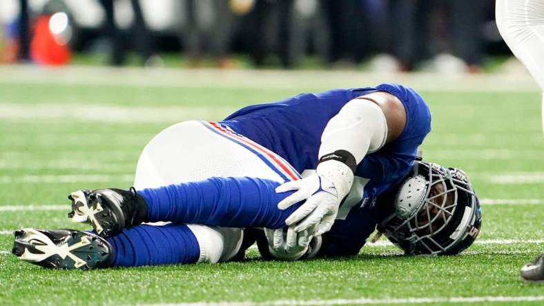 New York Giants defensive end Kayvon Thibodeaux (5) goes down during a preseason game against the Cincinnati Bengals at MetLife Stadium on August 21, 2022, in East Rutherford.

Nfl Ny Giants Preseason Game Vs Bengals Bengals At Giants