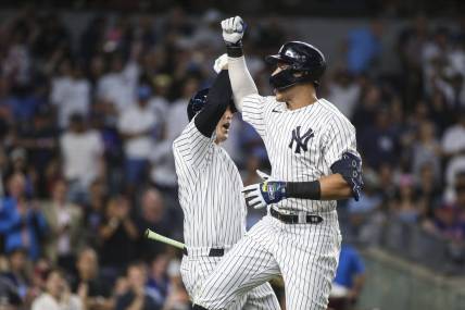 Aug 22, 2022; Bronx, New York, USA;  New York Yankees right fielder Aaron Judge (99) celebrates with first baseman Anthony Rizzo (48) after hitting a home run in the third inning against the New York Mets at Yankee Stadium. Mandatory Credit: Wendell Cruz-USA TODAY Sports