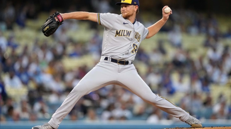 Aug 22, 2022; Los Angeles, California, USA; Milwaukee Brewers starting pitcher Eric Lauer (52) throws in the first inning against the Los Angeles Dodgers at Dodger Stadium. Mandatory Credit: Kirby Lee-USA TODAY Sports