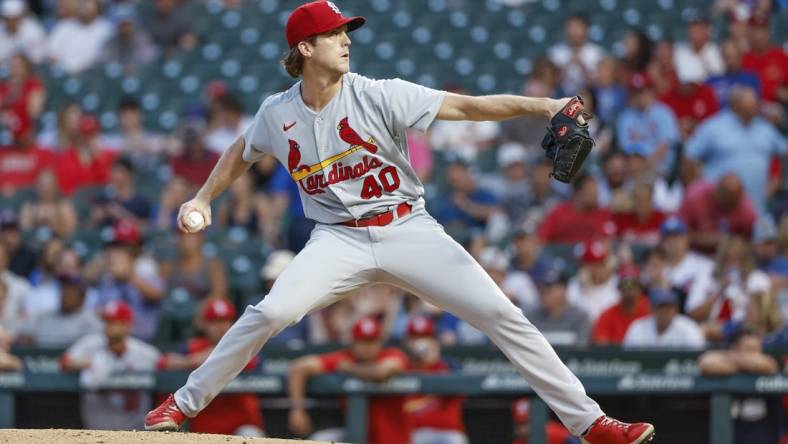 Aug 23, 2022; Chicago, Illinois, USA; St. Louis Cardinals starting pitcher Jake Woodford (40) delivers against the Chicago Cubs during the first inning of the second game of the doubleheader at Wrigley Field. Mandatory Credit: Kamil Krzaczynski-USA TODAY Sports