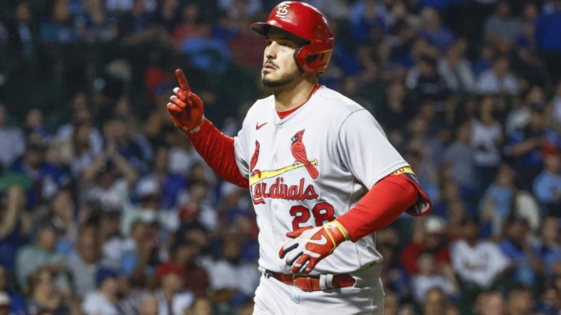 Aug 23, 2022; Chicago, Illinois, USA; St. Louis Cardinals third baseman Nolan Arenado (28) celebrates after hitting a solo home run against the Chicago Cubs during the fourth inning of the second game of the doubleheader at Wrigley Field. Mandatory Credit: Kamil Krzaczynski-USA TODAY Sports