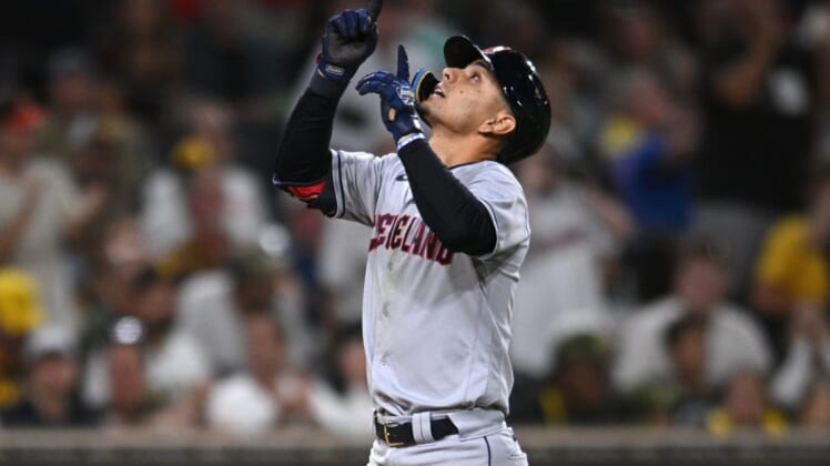 Aug 23, 2022; San Diego, California, USA; Cleveland Guardians second baseman Andres Gimenez (0) gestures while rounding the bases after hitting a home run against the San Diego Padres during the fifth inning at Petco Park. Mandatory Credit: Orlando Ramirez-USA TODAY Sports