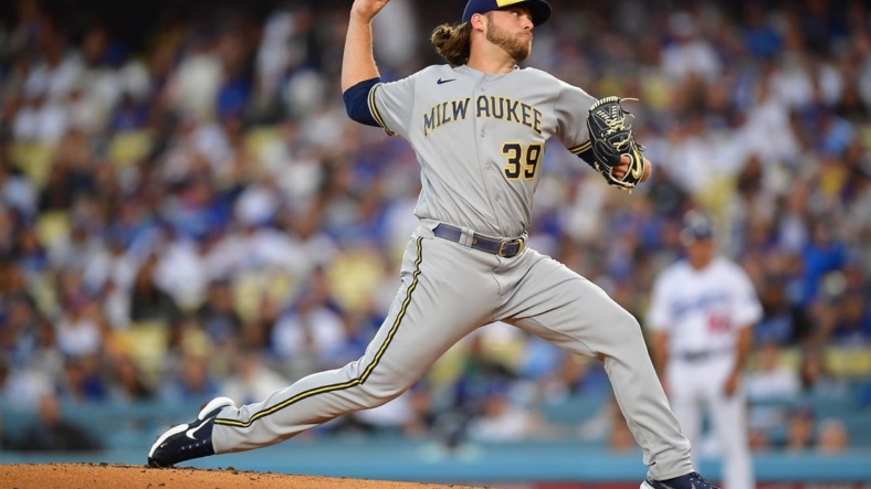 Aug 23, 2022; Los Angeles, California, USA; Milwaukee Brewers starting pitcher Corbin Burnes (39) throws against the Los Angeles Dodgers during the first inning at Dodger Stadium. Mandatory Credit: Gary A. Vasquez-USA TODAY Sports