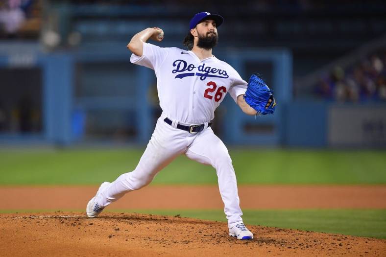 Aug 23, 2022; Los Angeles, California, USA; Los Angeles Dodgers starting pitcher Tony Gonsolin (26) throws against the Milwaukee Brewers during the third inning at Dodger Stadium. Mandatory Credit: Gary A. Vasquez-USA TODAY Sports