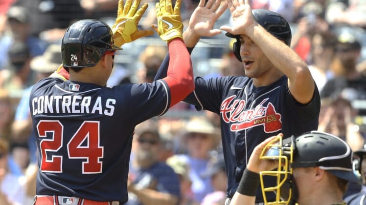 Aug 24, 2022; Pittsburgh, Pennsylvania, USA;  Atlanta Braves first baseman Matt Olson (28) greets catcher William Contreras (24) crossing home plate on a two run home run against the Pittsburgh Pirates during the second inning at PNC Park. Mandatory Credit: Charles LeClaire-USA TODAY Sports