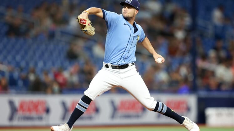 Aug 24, 2022; St. Petersburg, Florida, USA;  Tampa Bay Rays starting pitcher Shane McClanahan (18) throws a pitch against the Los Angeles Angels in the first inning at Tropicana Field. Mandatory Credit: Nathan Ray Seebeck-USA TODAY Sports