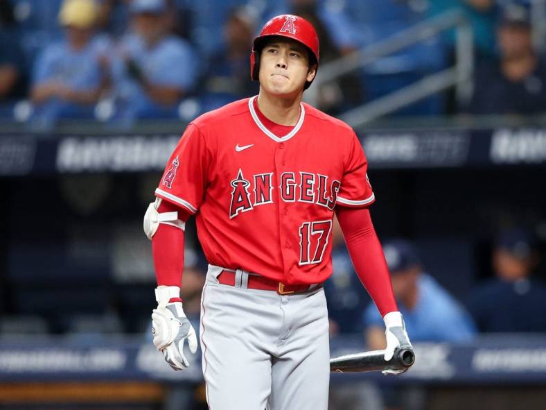 Aug 24, 2022; St. Petersburg, Florida, USA;  Los Angeles Angels designated hitter Shohei Ohtani (17) reacts after striking out against the Tampa Bay Rays in the first inning at Tropicana Field. Mandatory Credit: Nathan Ray Seebeck-USA TODAY Sports