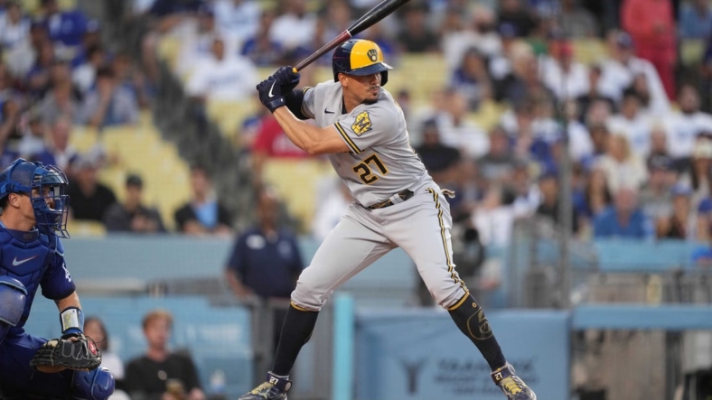 Aug 22, 2022; Los Angeles, California, USA; Milwaukee Brewers shortstop Willy Adames (27) bats against the Los Angeles Dodgers at Dodger Stadium. Mandatory Credit: Kirby Lee-USA TODAY Sports