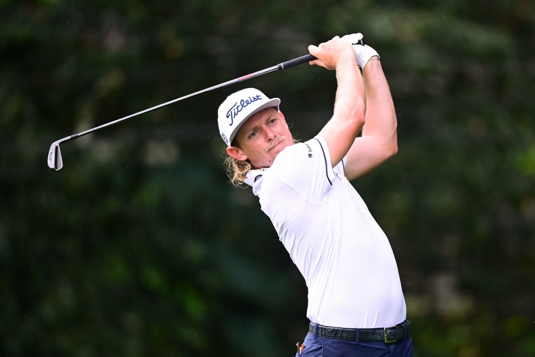 Aug 25, 2022; Atlanta, Georgia, USA; Cameron Smith tees off on the 2nd hole during the first round of the TOUR Championship golf tournament. Mandatory Credit: Adam Hagy-USA TODAY Sports