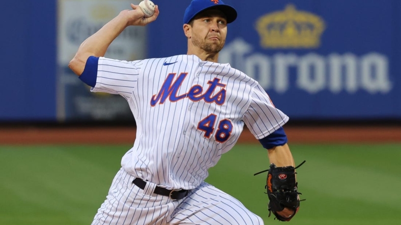 Aug 25, 2022; New York City, New York, USA; New York Mets starting pitcher Jacob deGrom (48) delivers a pitch  during the first inning against the Colorado Rockies at Citi Field. Mandatory Credit: Vincent Carchietta-USA TODAY Sports