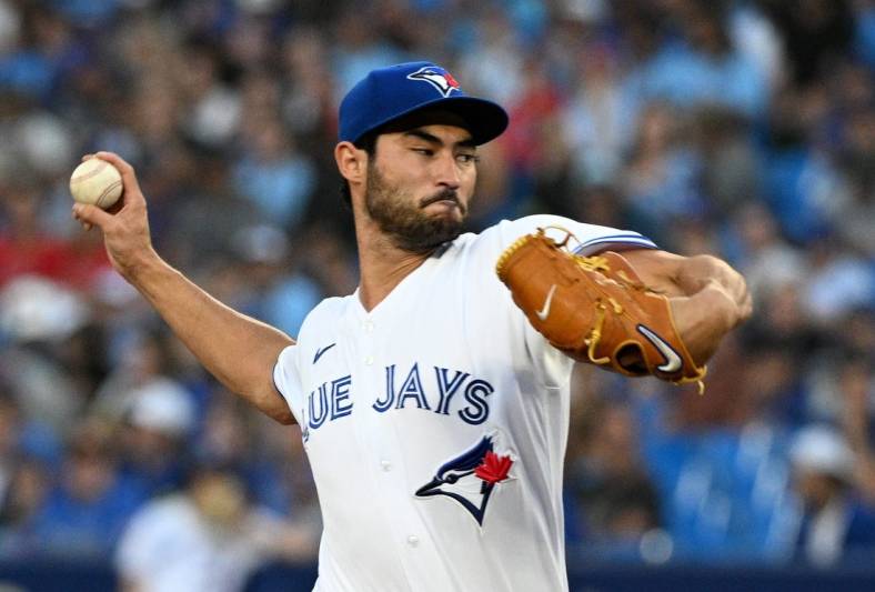 Aug 26, 2022; Toronto, Ontario, CAN;  Toronto Blue Jays starting pitcher Mitch White (45) delivers a pitch against the Los Angeles Angeles in the first inning at Rogers Centre. Mandatory Credit: Dan Hamilton-USA TODAY Sports