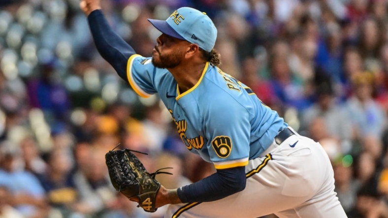 Aug 26, 2022; Milwaukee, Wisconsin, USA;  Milwaukee Brewers pitcher Freddy Peralta (51) throws a pitch in the first inning against the Chicago Cubs at American Family Field. Mandatory Credit: Benny Sieu-USA TODAY Sports