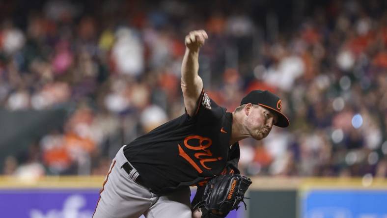 Aug 26, 2022; Houston, Texas, USA; Baltimore Orioles starting pitcher Kyle Bradish (56) delivers a pitch during the second inning against the Houston Astros at Minute Maid Park. Mandatory Credit: Troy Taormina-USA TODAY Sports