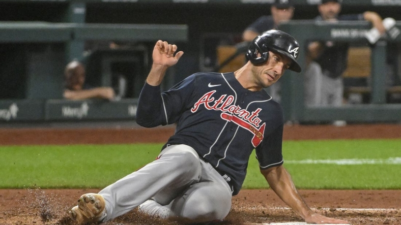 Aug 26, 2022; St. Louis, Missouri, USA;  Atlanta Braves first baseman Matt Olson (28) slides safely in at home against the St. Louis Cardinals during the fourth inning at Busch Stadium. Mandatory Credit: Jeff Curry-USA TODAY Sports