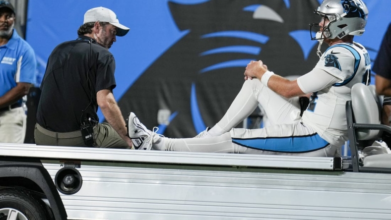 Panthers' Darnold carted off field with sprained ankle