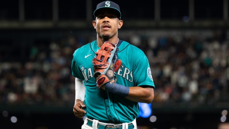 Aug 26, 2022; Seattle, Washington, USA; Seattle Mariners center fielder Julio Rodriguez (44) jogs off the field after the top of the seventh inning against the Cleveland Guardians at T-Mobile Park. Mandatory Credit: Steven Bisig-USA TODAY Sports