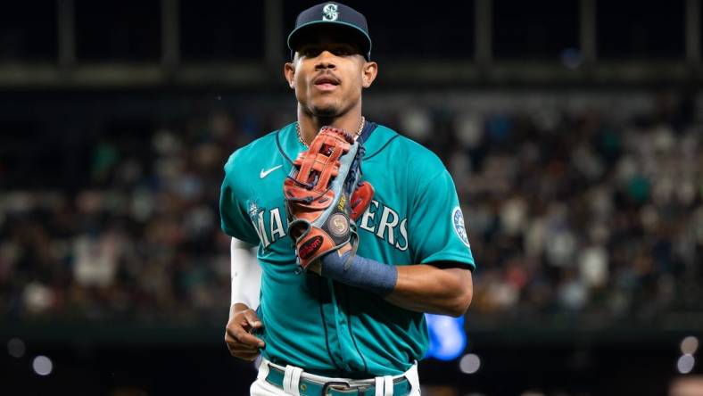 Aug 26, 2022; Seattle, Washington, USA; Seattle Mariners center fielder Julio Rodriguez (44) jogs off the field after the top of the seventh inning against the Cleveland Guardians at T-Mobile Park. Mandatory Credit: Steven Bisig-USA TODAY Sports