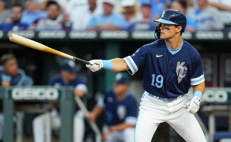 Aug 12, 2022; Kansas City, Missouri, USA; Kansas City Royals second baseman Michael Massey (19) bats against the Los Angeles Dodgers during the third inning at Kauffman Stadium. Mandatory Credit: Jay Biggerstaff-USA TODAY Sports