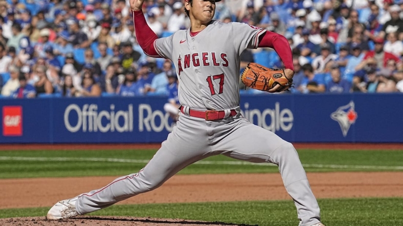Aug 27, 2022; Toronto, Ontario, CAN; Los Angeles Angels starting pitcher Shohei Ohtani (17) pitches to the Toronto Blue Jays during the second inning at Rogers Centre. Mandatory Credit: John E. Sokolowski-USA TODAY Sports