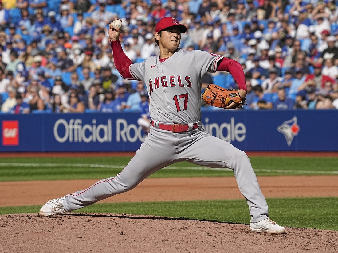 Aug 27, 2022; Toronto, Ontario, CAN; Los Angeles Angels starting pitcher Shohei Ohtani (17) pitches to the Toronto Blue Jays during the second inning at Rogers Centre. Mandatory Credit: John E. Sokolowski-USA TODAY Sports