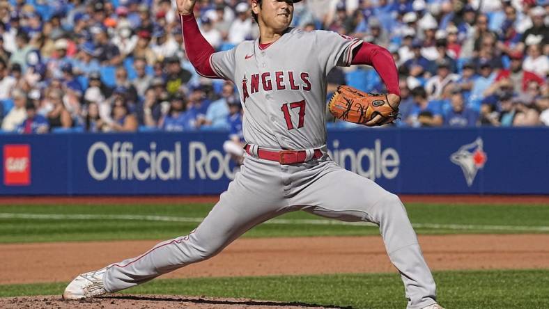 Aug 27, 2022; Toronto, Ontario, CAN; Los Angeles Angels starting pitcher Shohei Ohtani (17) pitches to the Toronto Blue Jays during the second inning at Rogers Centre. Mandatory Credit: John E. Sokolowski-USA TODAY Sports