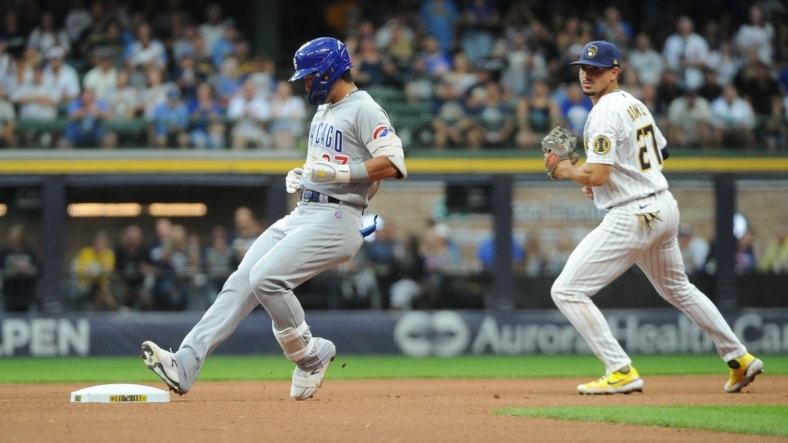 Aug 27, 2022; Milwaukee, Wisconsin, USA; Milwaukee Brewers shortstop Willy Adames (27) hits a double in the third inning against the Milwaukee Brewers at American Family Field. Mandatory Credit: Michael McLoone-USA TODAY Sports