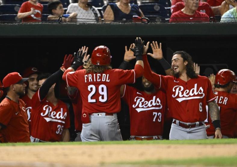 Aug 27, 2022; Washington, District of Columbia, USA; Cincinnati Reds left fielder TJ Friedl (29) is congratulated by teammates after hitting a three run home run against the Washington Nationals during the sixth inning at Nationals Park. Mandatory Credit: Brad Mills-USA TODAY Sports