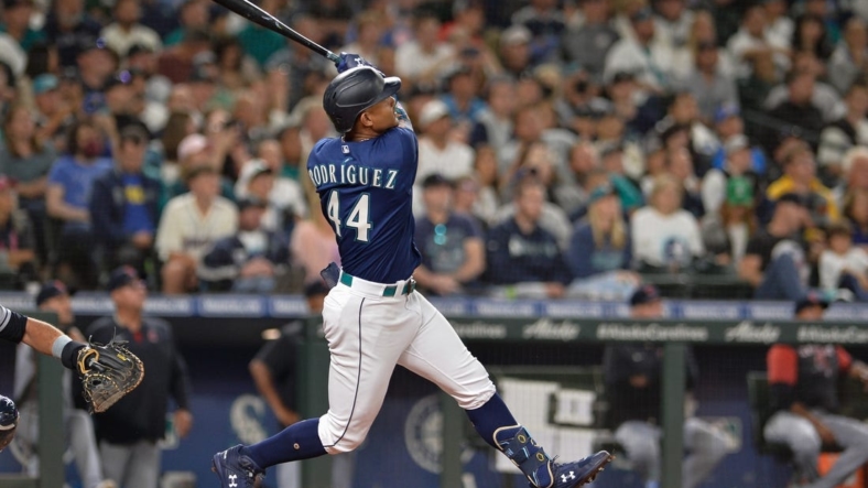 Aug 27, 2022; Seattle, Washington, USA; Seattle Mariners center fielder Julio Rodriguez (44) hits a home run against the Cleveland Guardians during the third inning at T-Mobile Park. Mandatory Credit: Steven Bisig-USA TODAY Sports