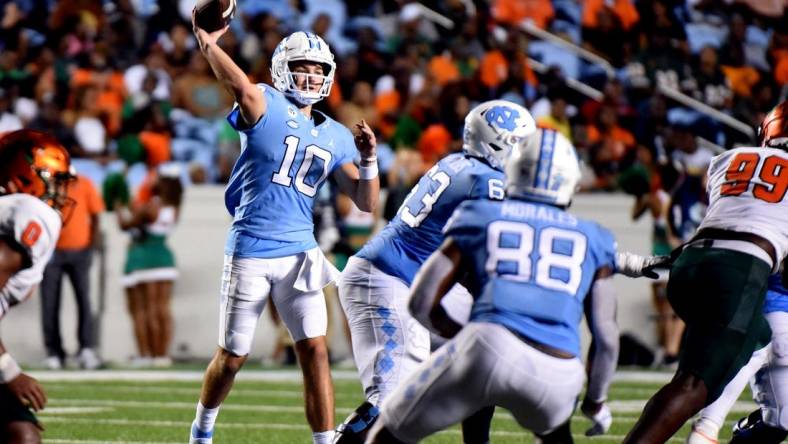 Aug 27, 2022; Chapel Hill, North Carolina, USA;North Carolina Tar Heels quarterback Drake Maye (10) throws a pass against the Florida A&M Rattlers during the second half at Kenan Memorial Stadium. Mandatory Credit: Rob Kinnan-USA TODAY Sports