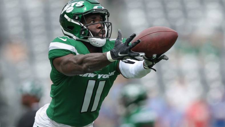 Aug 28, 2022; East Rutherford, New Jersey, USA; New York Jets wide receiver Denzel Mims (11) catches the ball before the game against the New York Giants at MetLife Stadium. Mandatory Credit: Vincent Carchietta-USA TODAY Sports