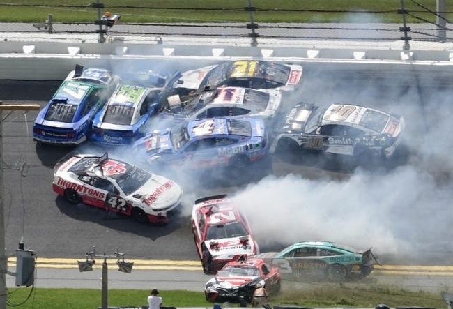 Austin Dillon (No. 3) picks his way through the mess and toward the lead after the major crash in Turns 1 and 2.Coke 400 Dillon Sneaks