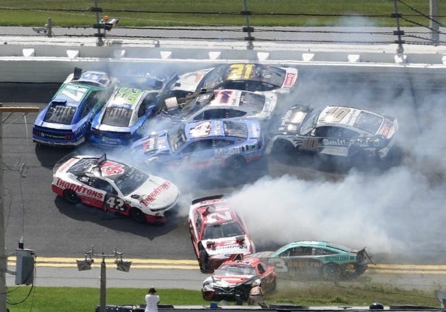 Austin Dillon (No. 3) picks his way through the mess and toward the lead after the major crash in Turns 1 and 2.

Coke 400 Dillon Sneaks