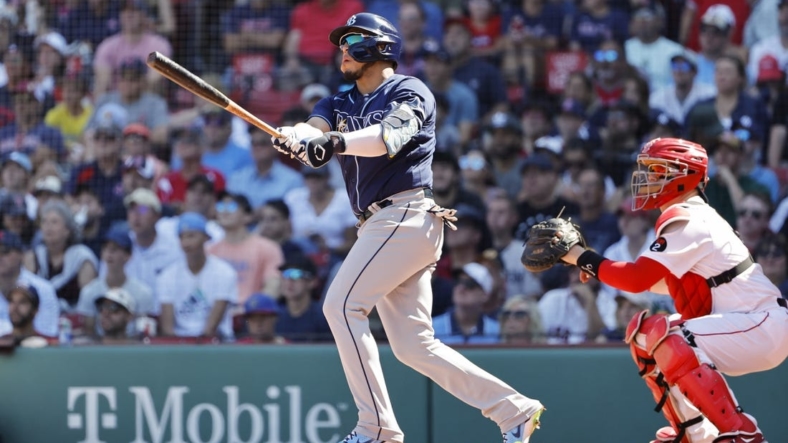Aug 28, 2022; Boston, Massachusetts, USA; Tampa Bay Rays third baseman Isaac Paredes (17) watches his two-run home run against the Boston Red Sox during the fourth inning at Fenway Park. Mandatory Credit: Winslow Townson-USA TODAY Sports